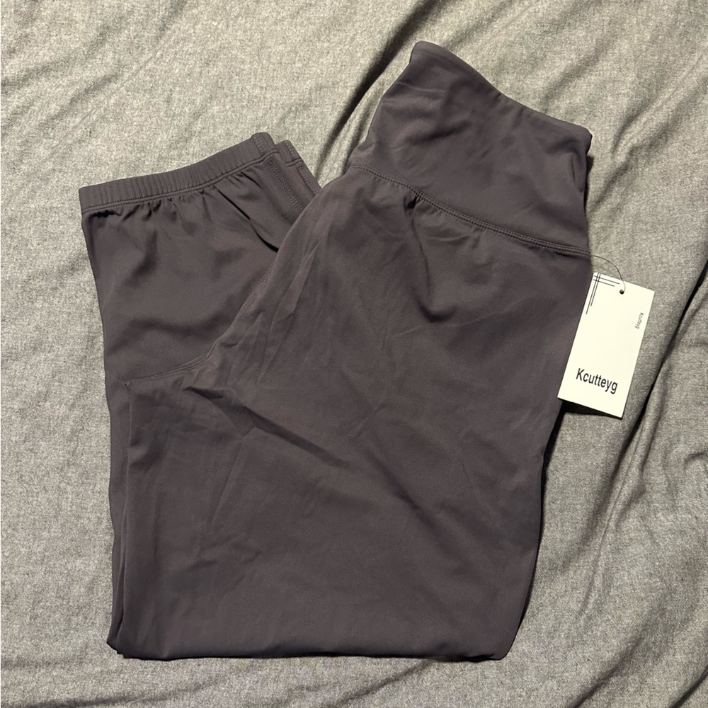 Brand new. Never worn. Grey joggers